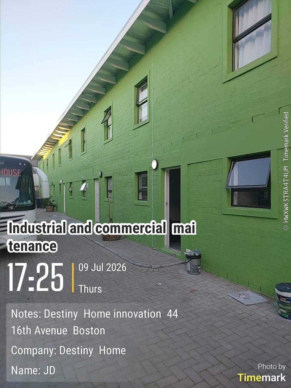 Commercial building exterior painted in bold green