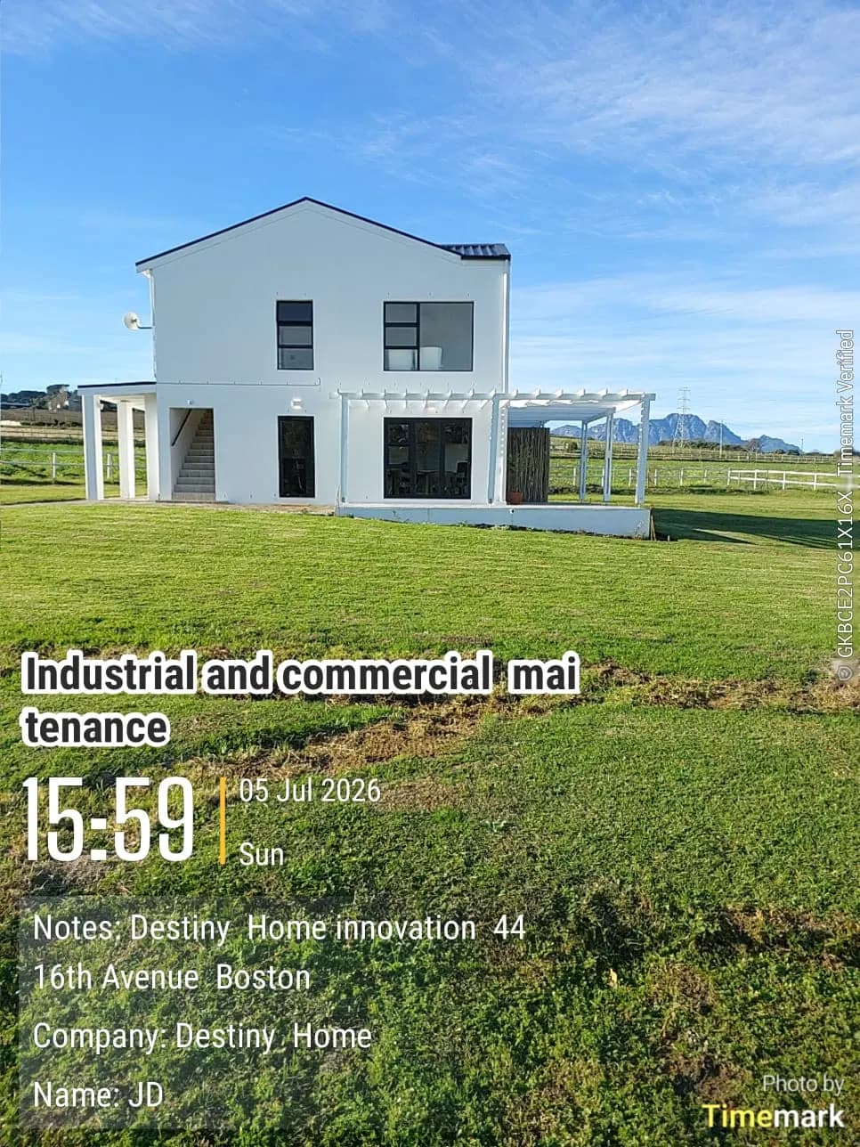 Completed white exterior painting with Boland mountain views